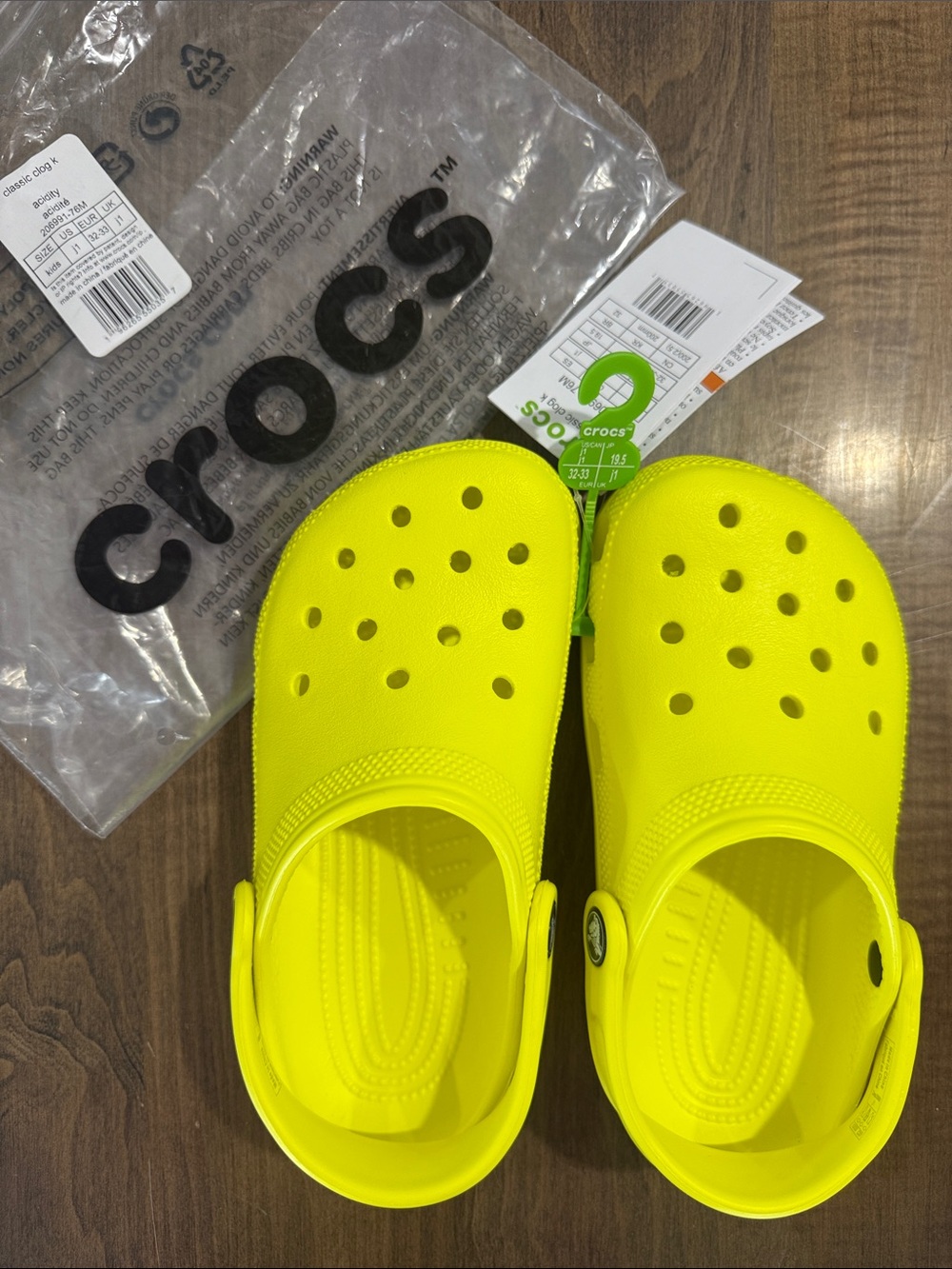 CROCS Kids Classic Clog in Bright Yellow - Youth size 1
